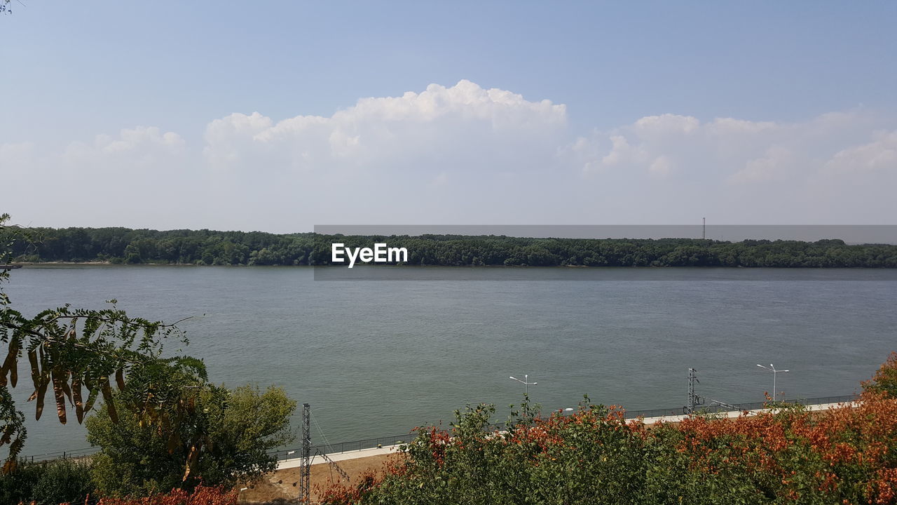 View of lake against cloudy sky