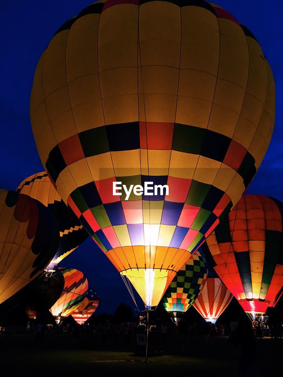 Low angle view of multi colored balloons