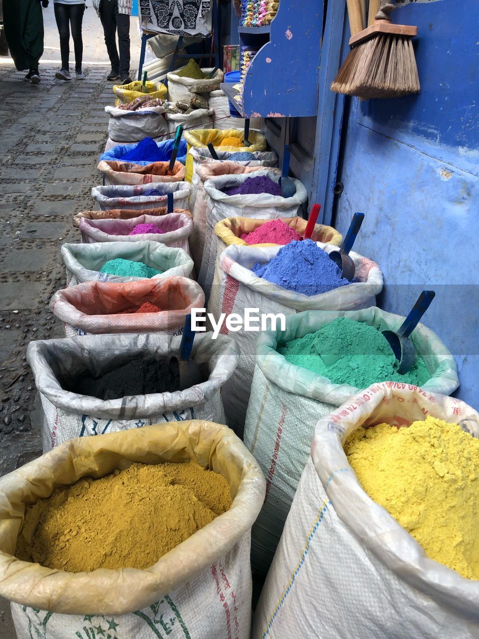 High angle view of multi colored powder paint for sale at market stall