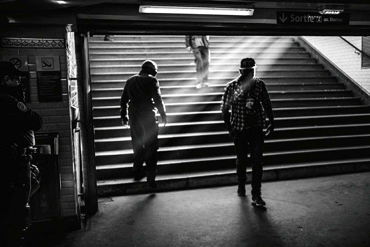 Men at subway station
