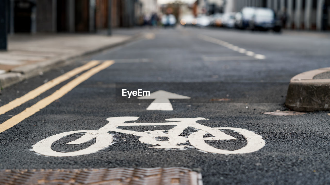 Selective focus bicycle lane sign