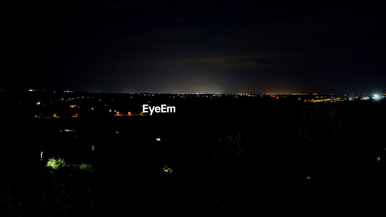 night, illuminated, sky, darkness, no people, city, architecture, building exterior, nature, cityscape, light, dark, outdoors, copy space, built structure, scenics - nature, beauty in nature, building, dusk