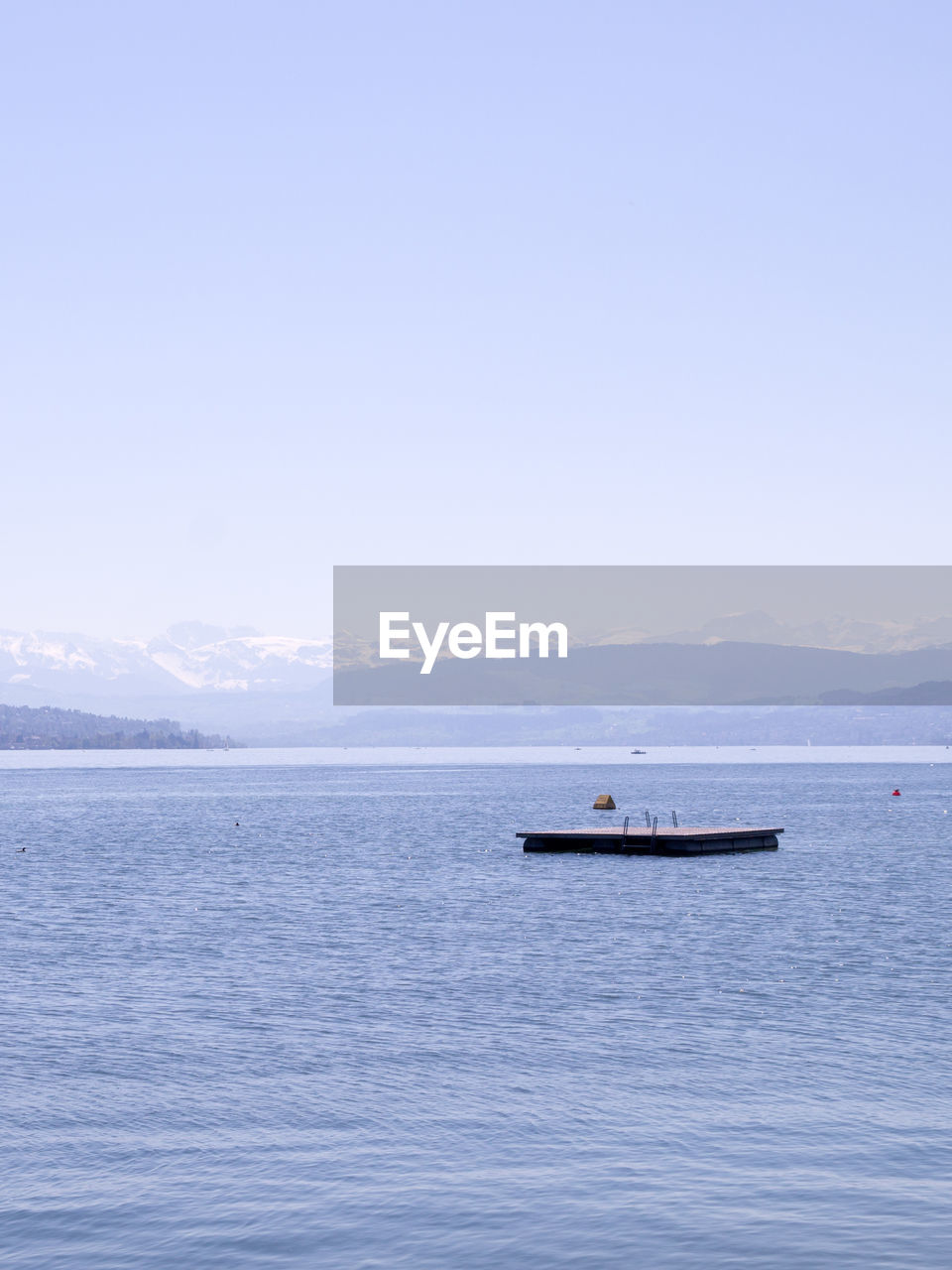 SCENIC VIEW OF SEA AGAINST BLUE SKY