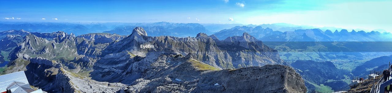 PANORAMIC VIEW OF ROCKS AGAINST SKY