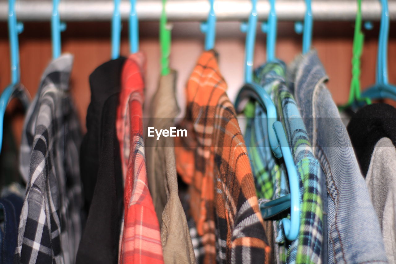 Close-up of clothing in the closet.