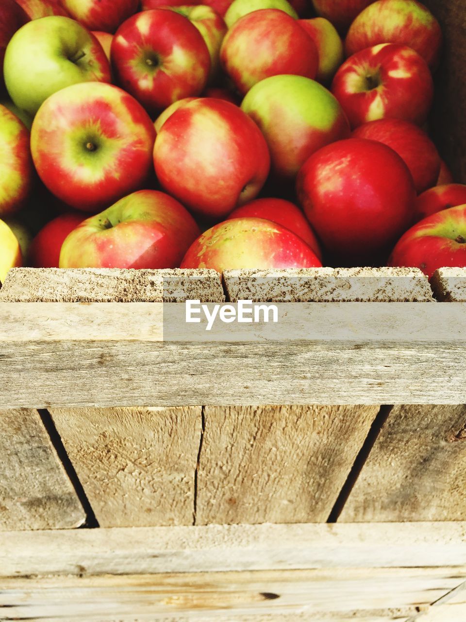 Close-up of apples in crate