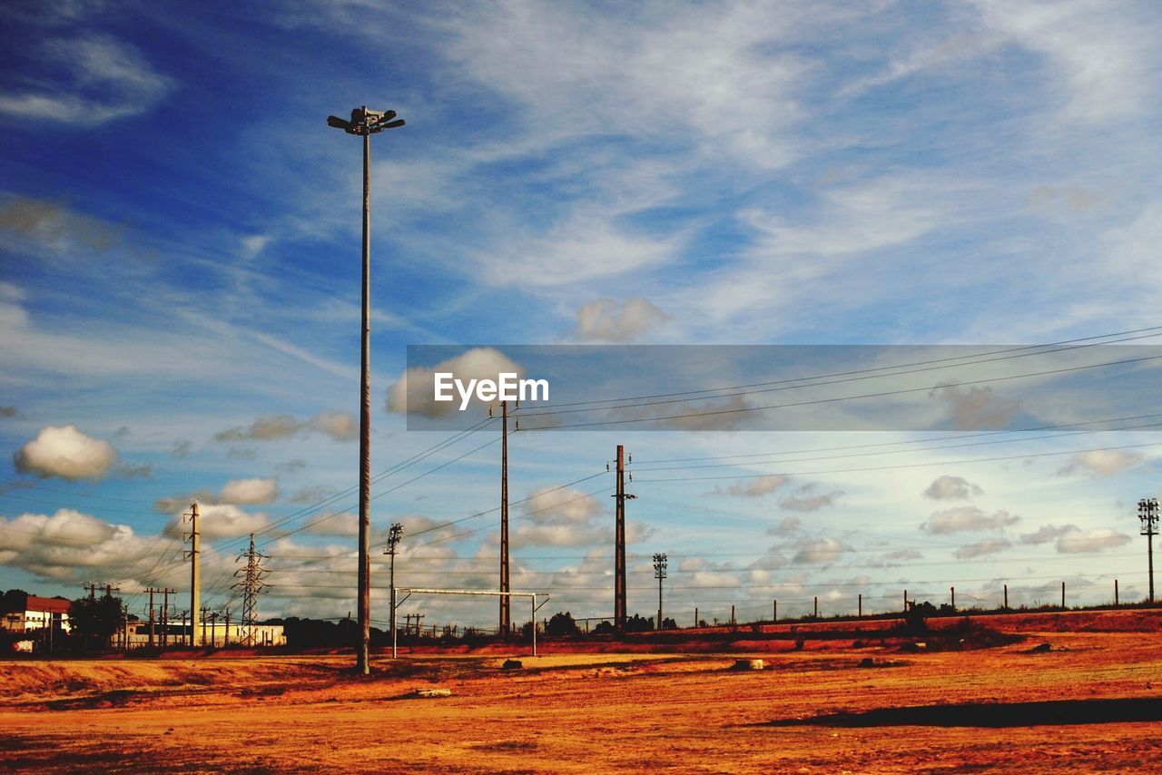 LOW ANGLE VIEW OF ELECTRICITY PYLON AGAINST SKY