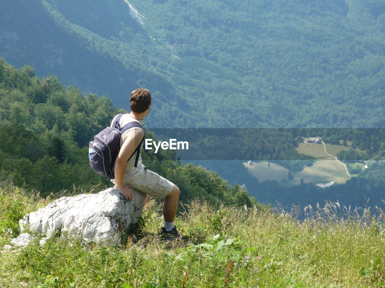 SCENIC VIEW OF LAKE AND MOUNTAINS