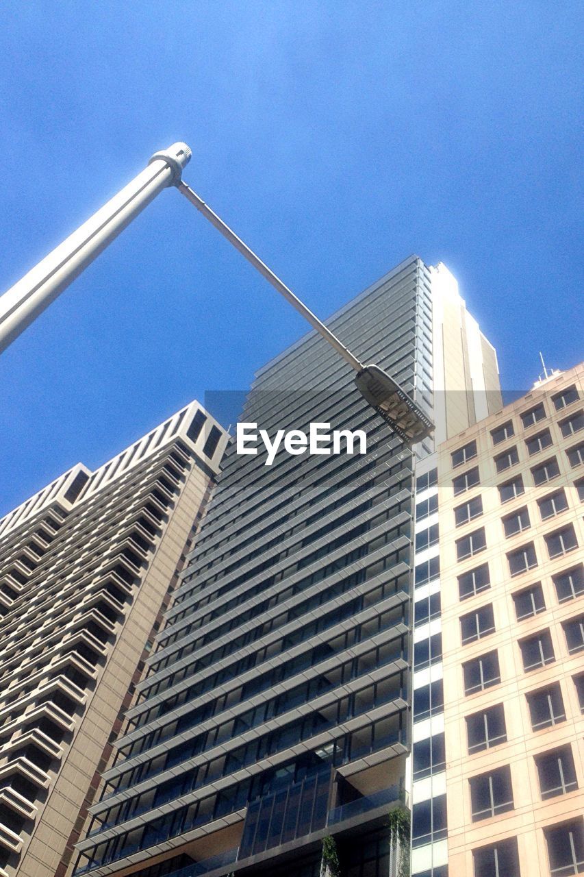 LOW ANGLE VIEW OF MODERN BUILDINGS