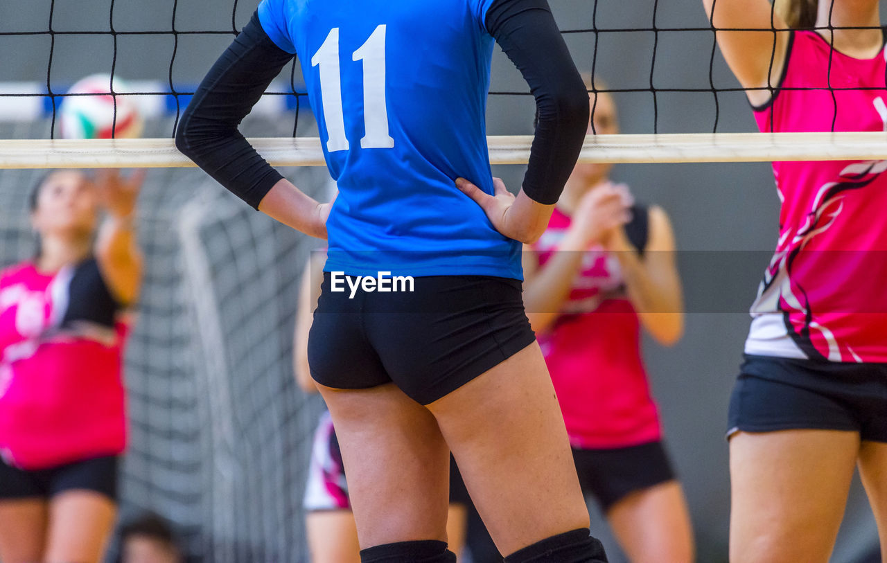 Women playing volleyball