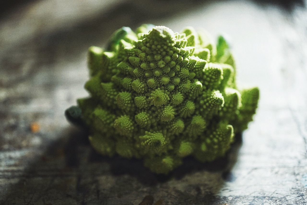 Close-up of romanesco cauliflower on table