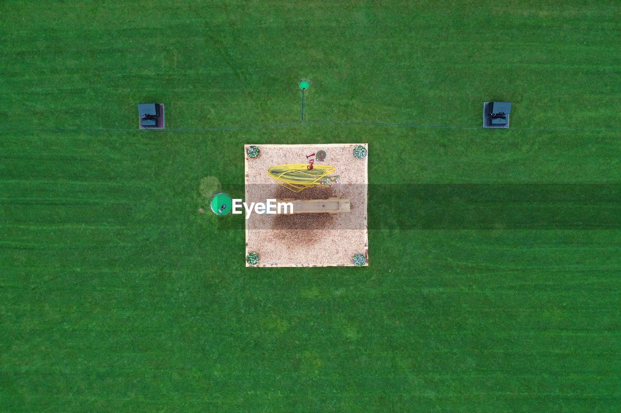 high angle view of text on green field