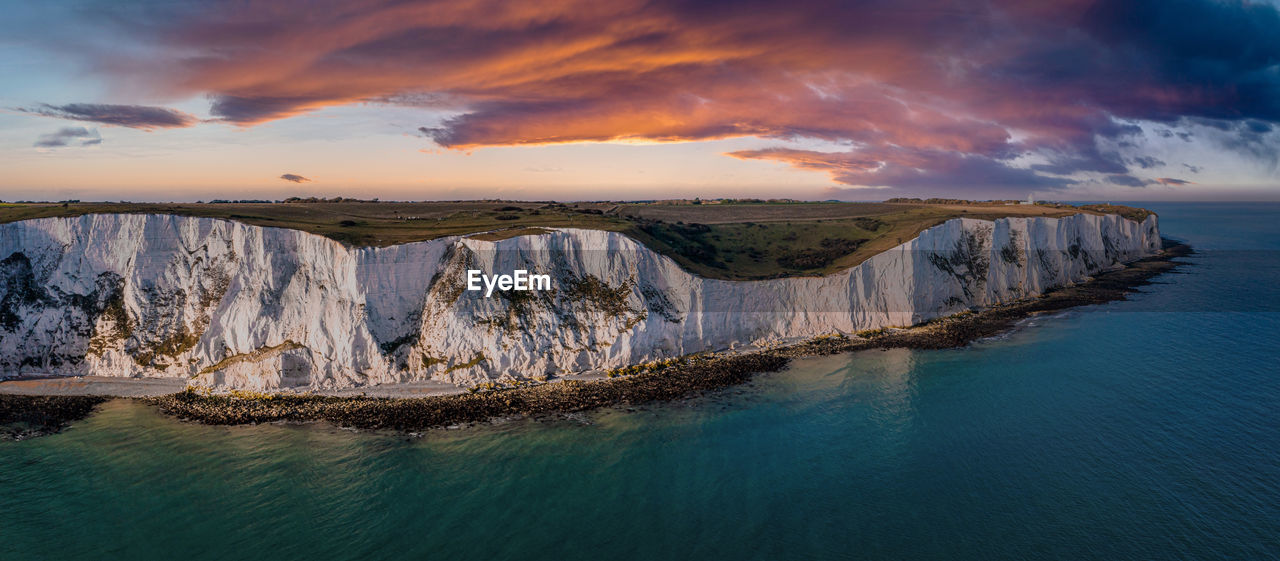 Aerial view of the white cliffs of dover. close up view of the cliffs from the sea side.
