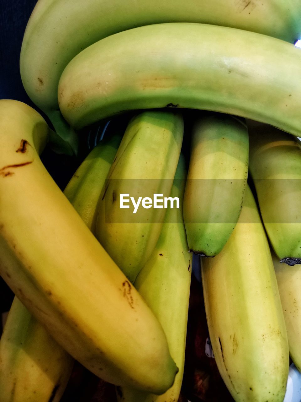 CLOSE-UP OF BANANAS IN MARKET