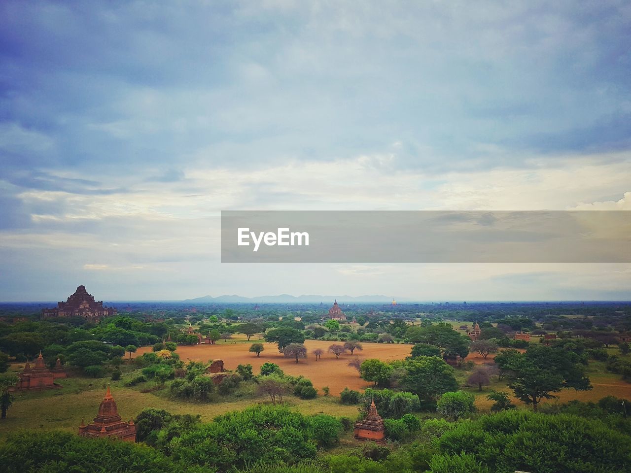 High angle view of historic temples on field against sky