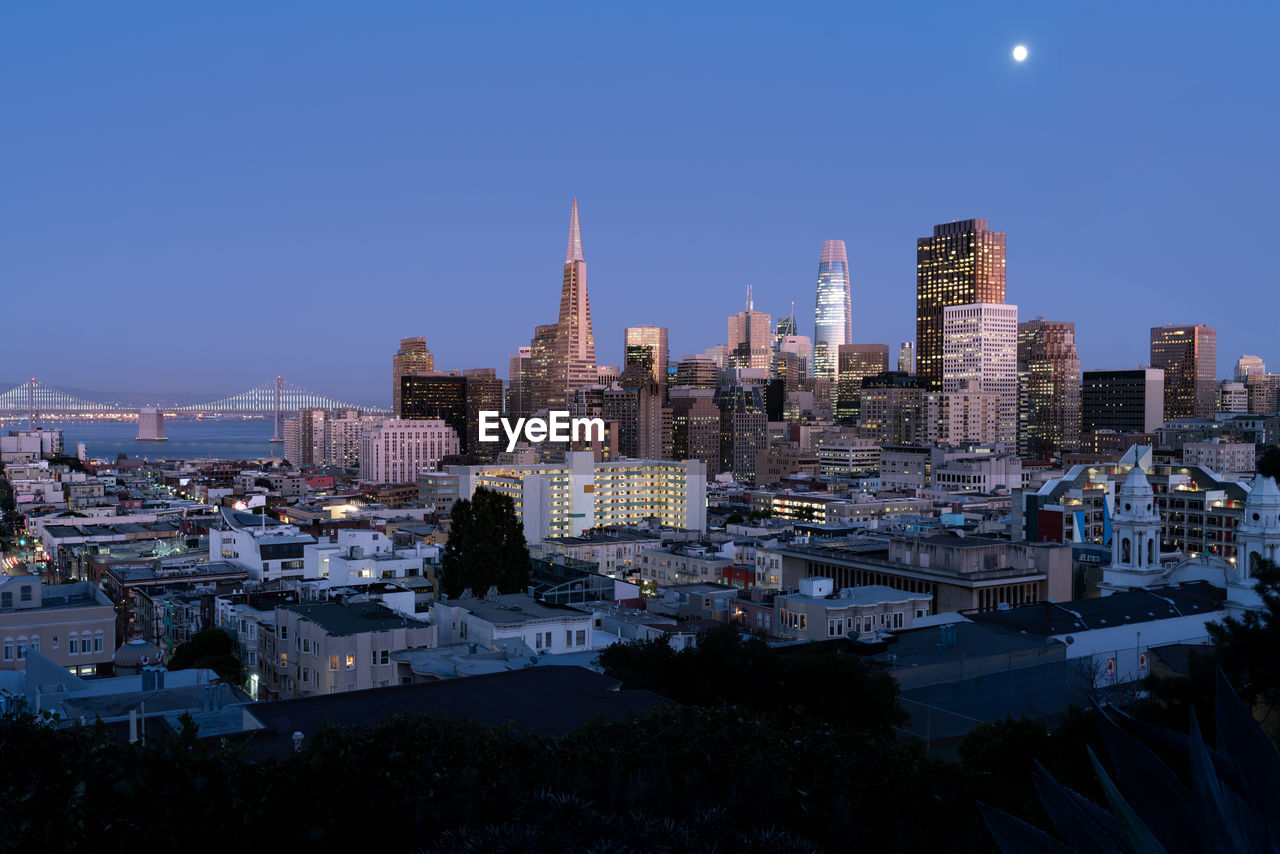 CITYSCAPE AGAINST CLEAR BLUE SKY