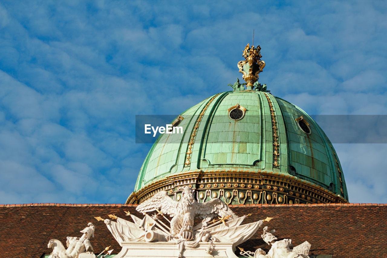 Blue danube, just in the sky. detail of the dome at innerer burghof, hofburg, wien, austria.