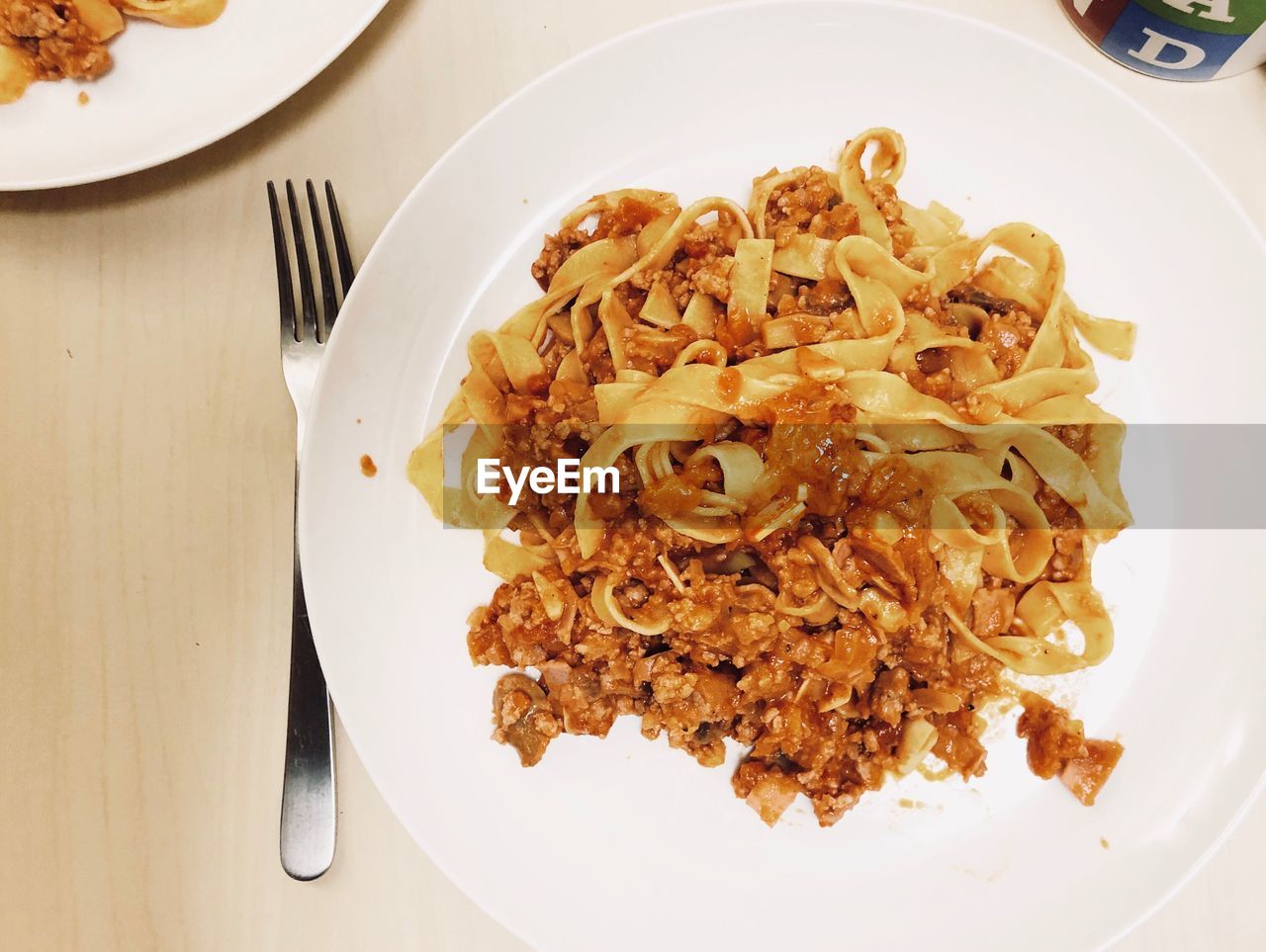 High angle view of italian food in plate on table