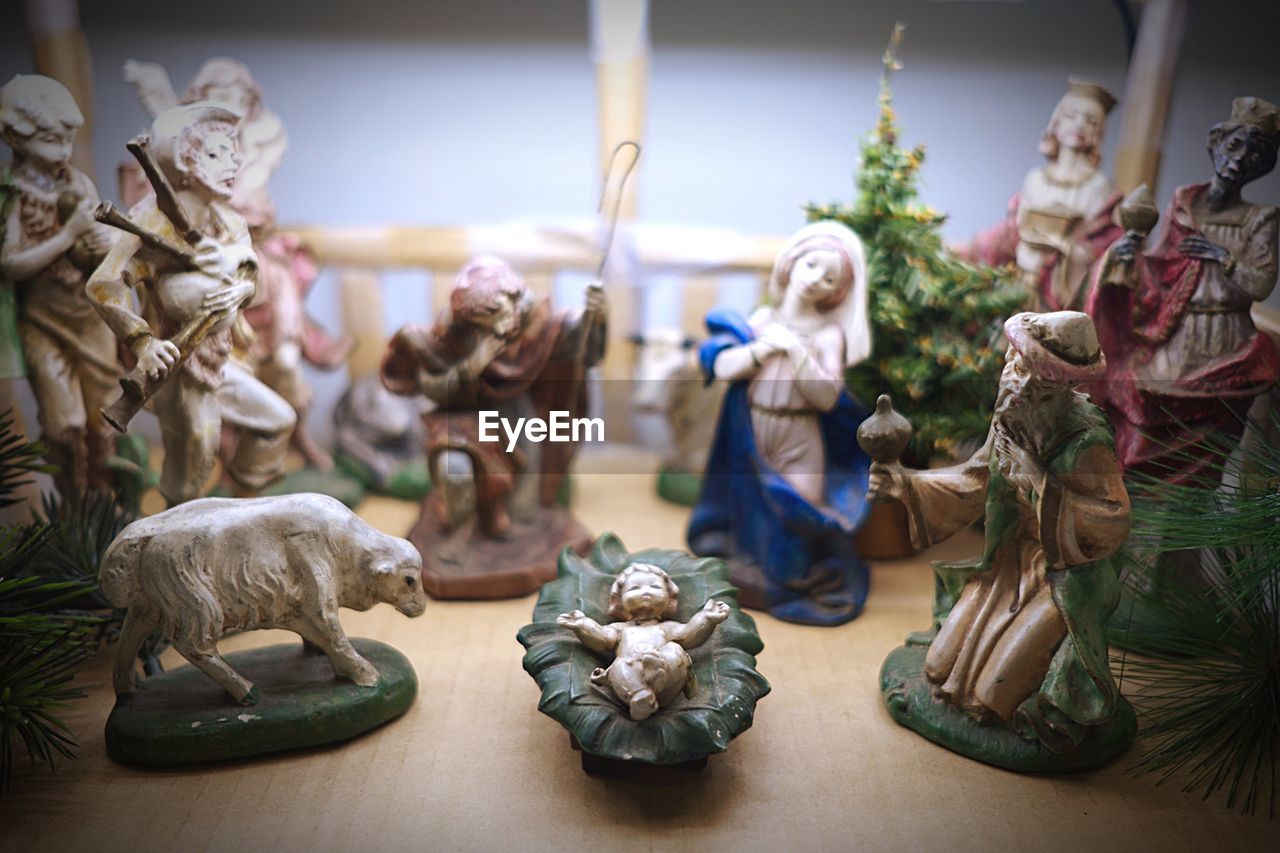 Close-up of christmas figurines on table