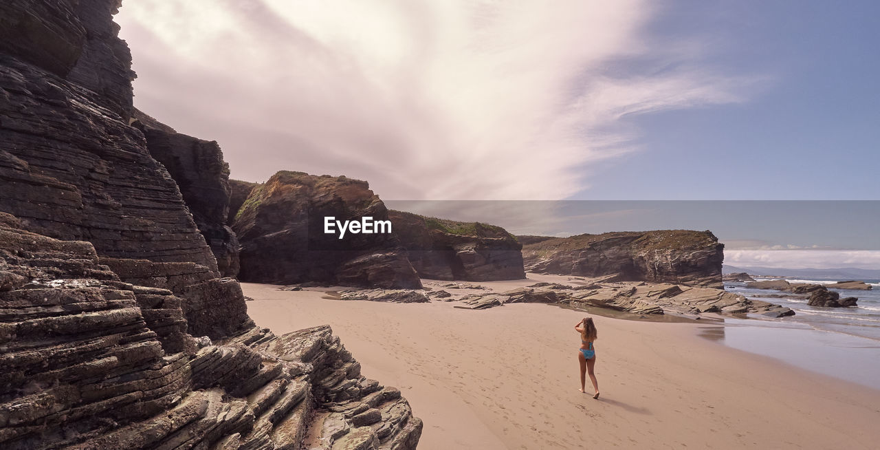 Full length of woman on beach