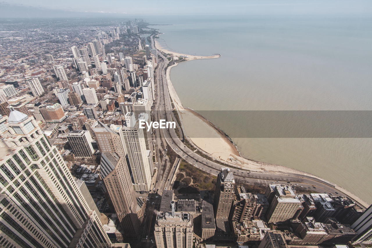 HIGH ANGLE VIEW OF CITY AGAINST BUILDINGS