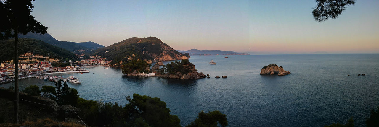 Scenic view of sea against sky at sunset