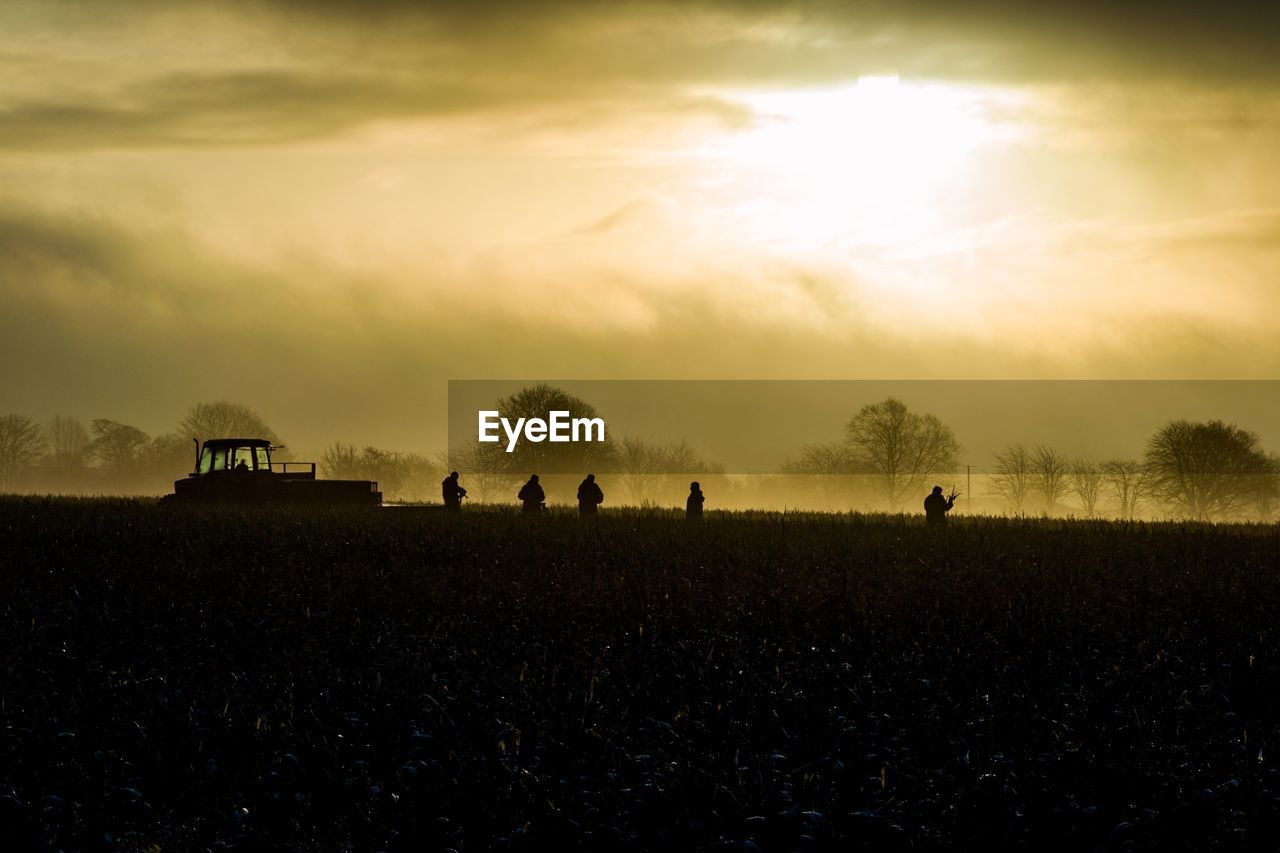 SILHOUETTE FIELD AGAINST SKY DURING SUNSET