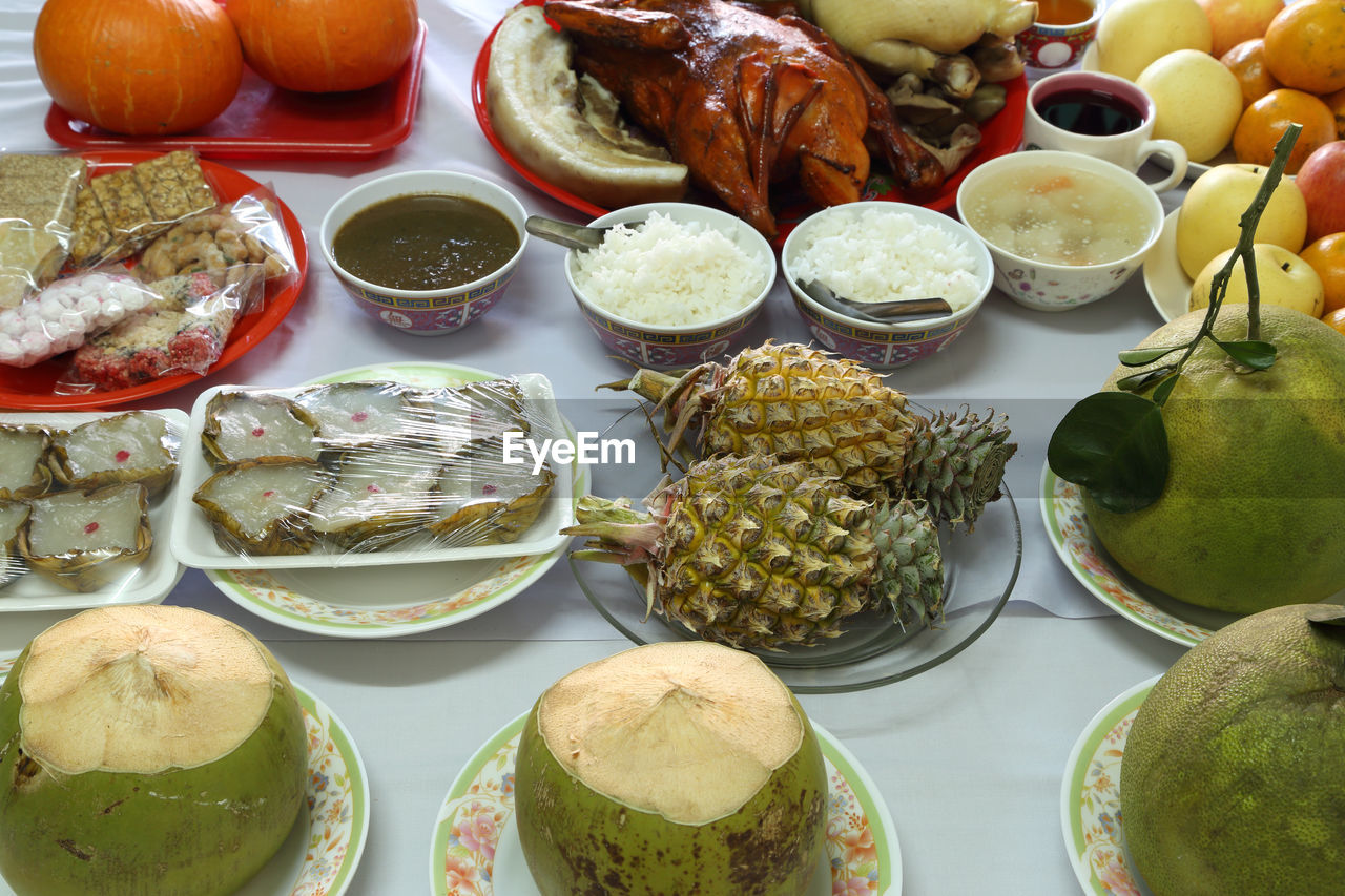 HIGH ANGLE VIEW OF VARIOUS FRUITS ON TABLE