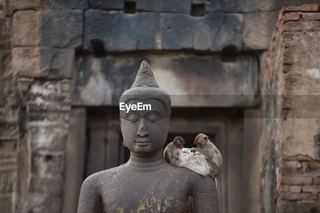 low angle view of buddha statue