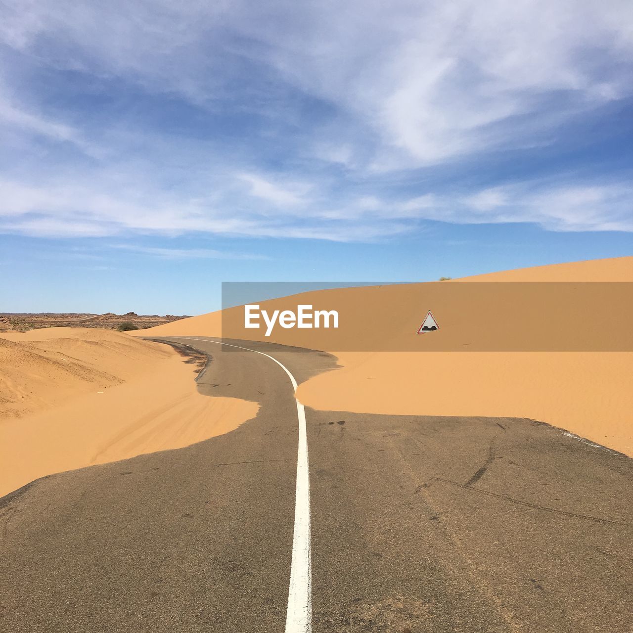 Scenic view of desert against sky, in the sahara desert in mauritania. big road full of sand 