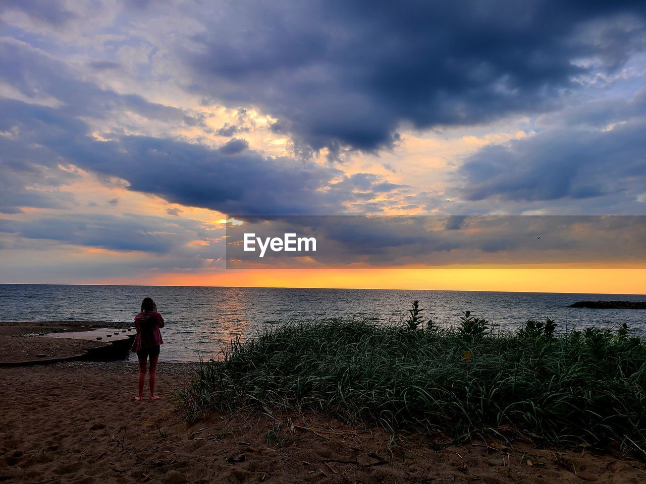 Scenic view of sea against sky during sunset