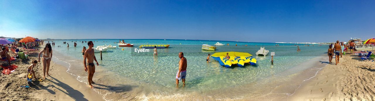 PANORAMIC VIEW OF BEACH AGAINST CLEAR SKY