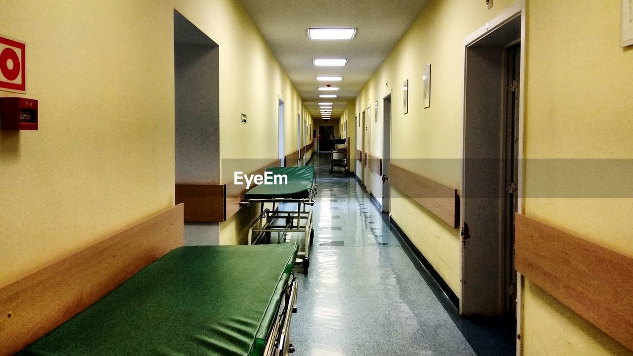 EMPTY CORRIDOR ALONG BUILDING