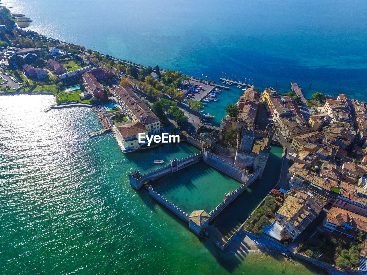 High angle view of townscape amidst sea