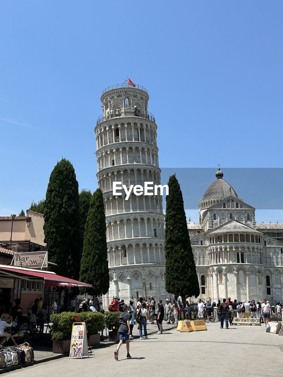 architecture, built structure, sky, building exterior, clear sky, nature, skyscraper, city, day, building, low angle view, blue, outdoors, travel destinations, tower, no people, sunny, vehicle, landmark, travel