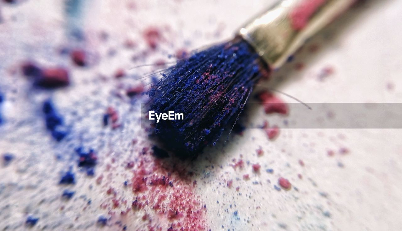 High angle view of paintbrush on table 