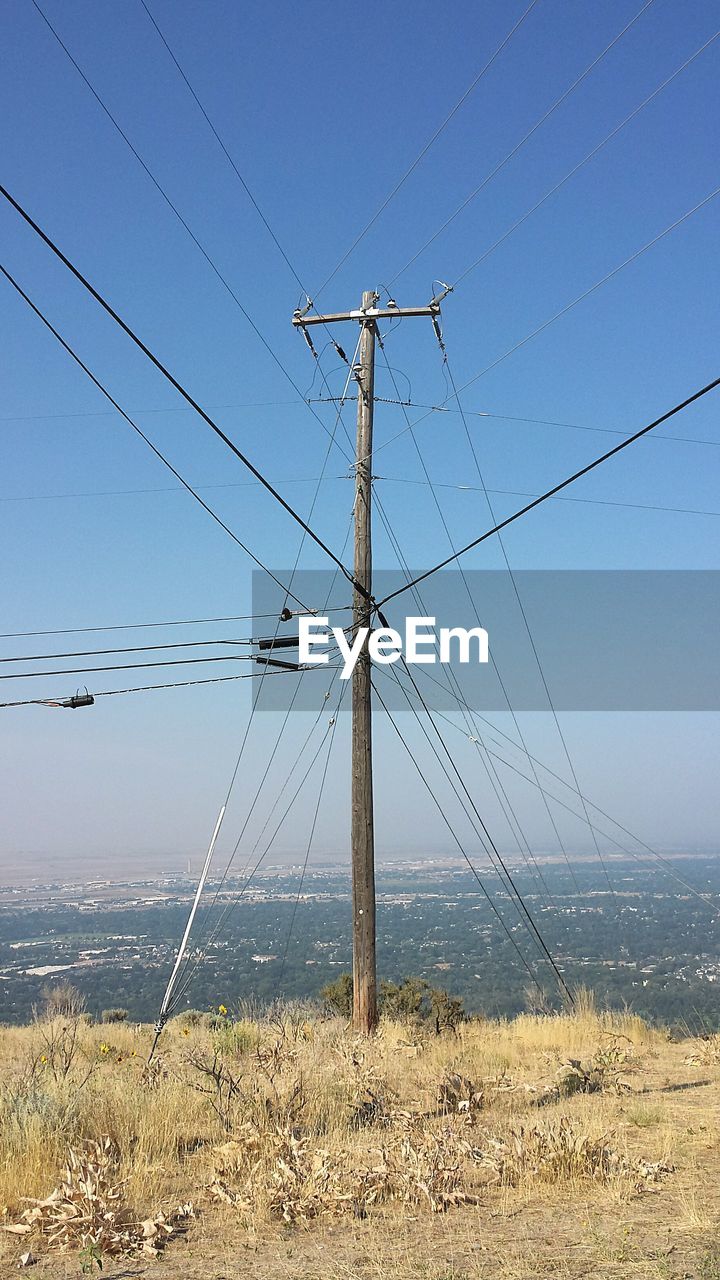 ELECTRICITY PYLON ON FIELD