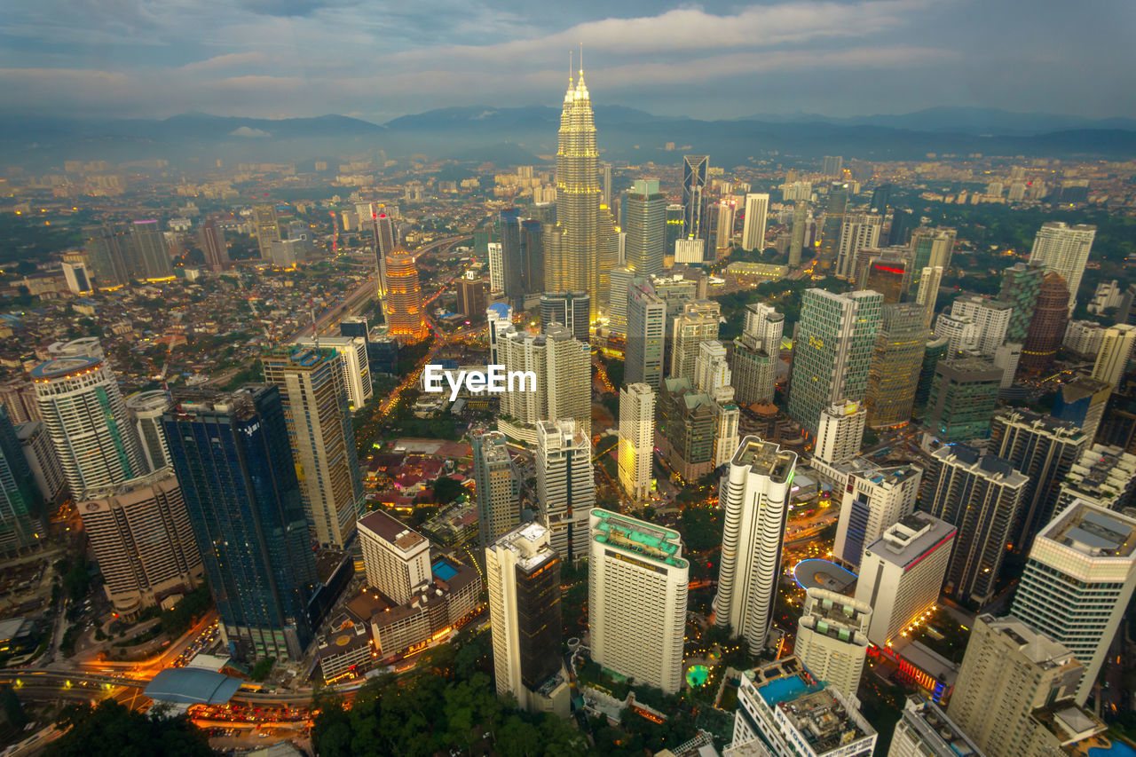 High angle view of petronas towers in illuminated city