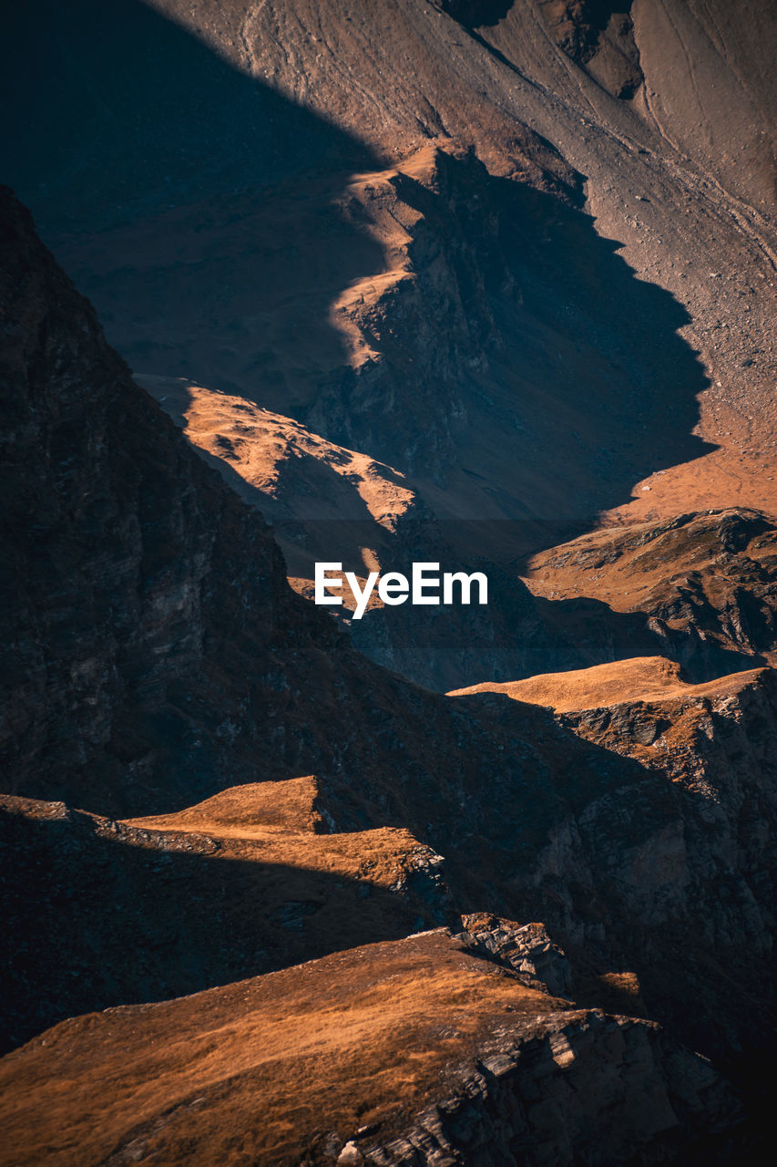 Game of light and shadow in the mountains of the austrian alps near gastein, salzburg.