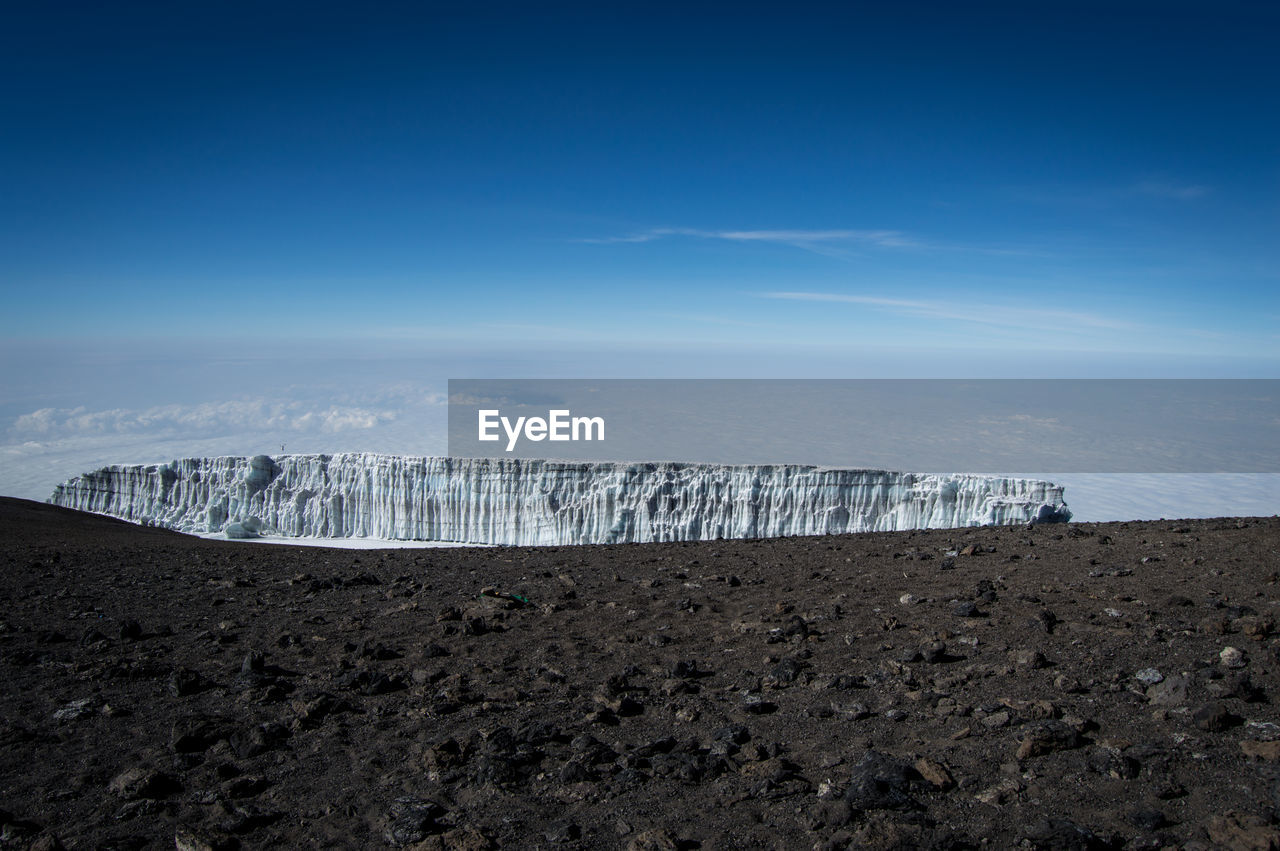 Ice wall on barren landscape