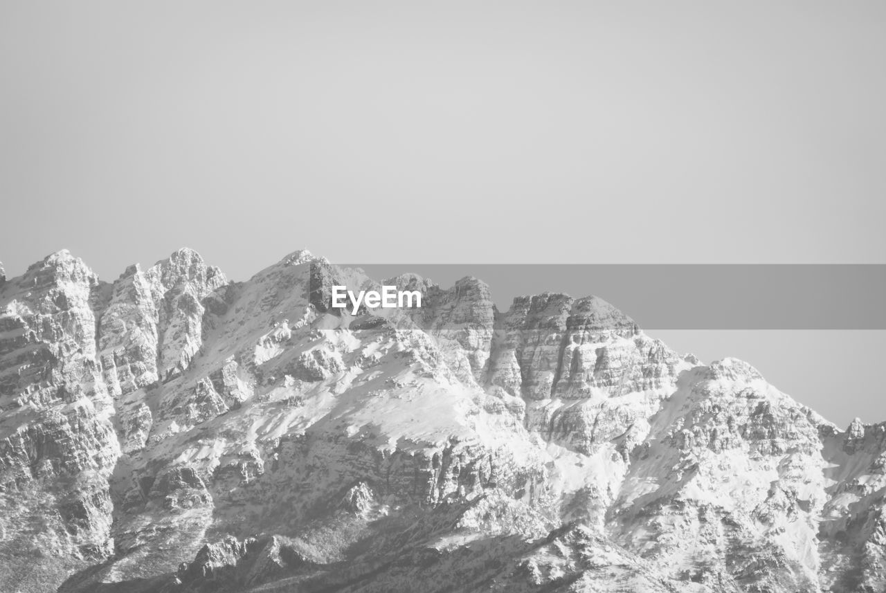 SNOWCAPPED MOUNTAIN AGAINST CLEAR SKY