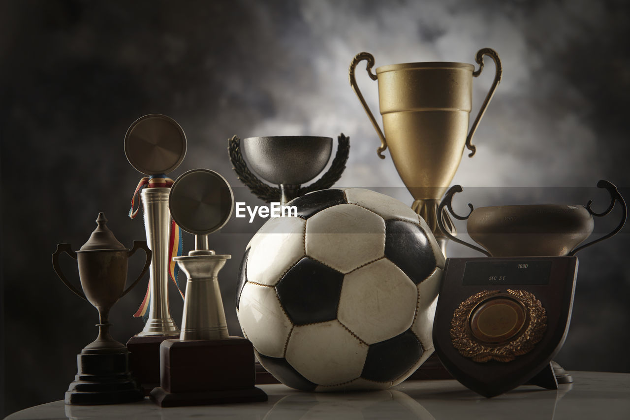 Football and group of trophy