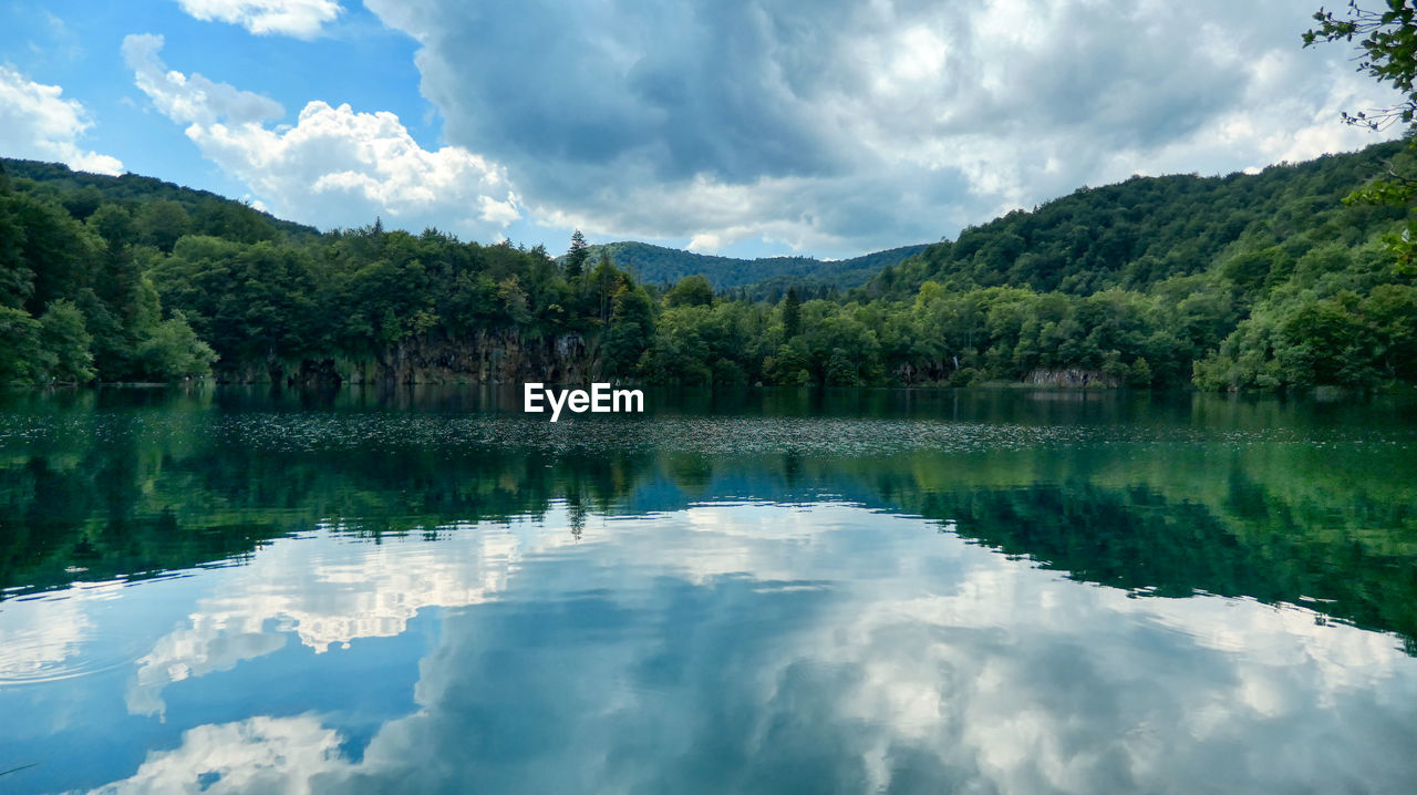 Scenic view of lgalovac ake and mountains against sky