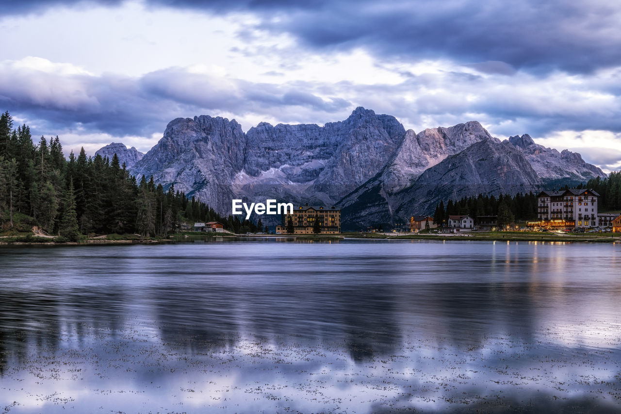 The view of lake misurina and mount sorapiss sunrise view taken during summer. dolomite, italy.