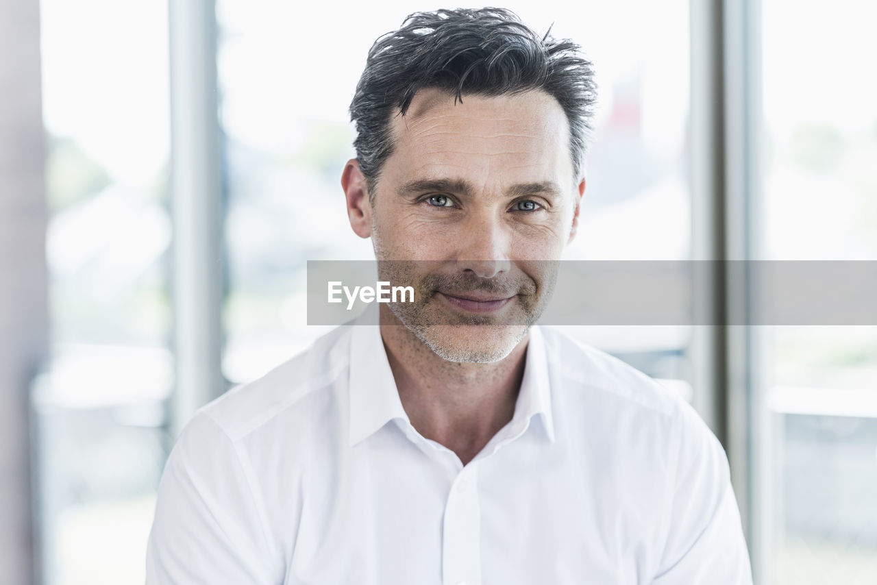 Portrait of smiling businessman