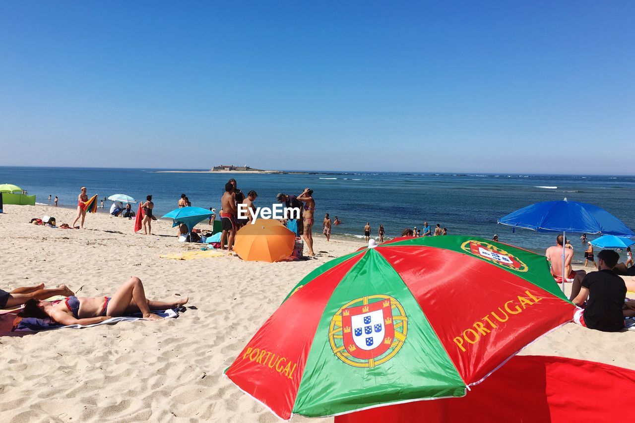 TOURISTS ON BEACH