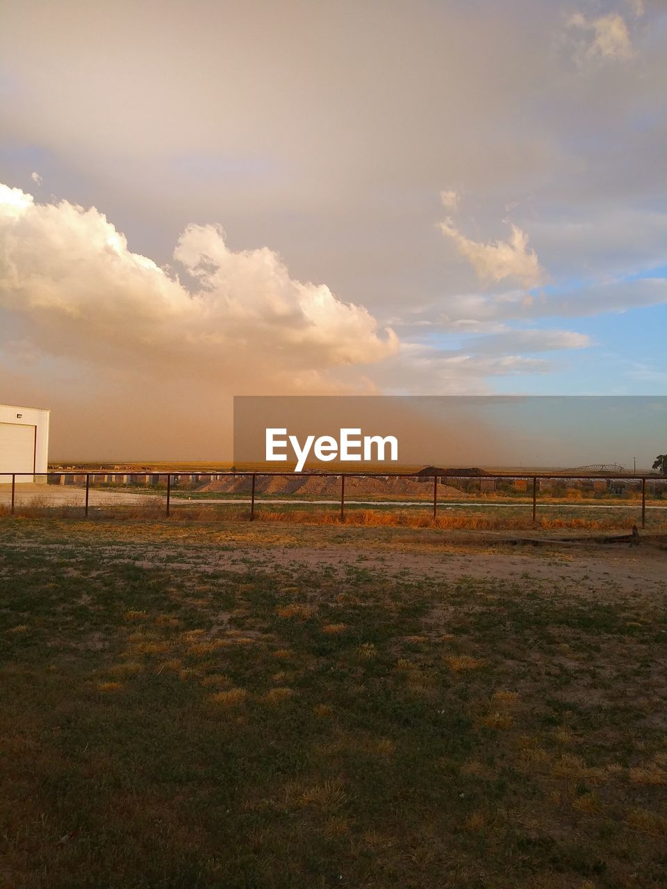 SCENIC VIEW OF FIELD DURING SUNSET