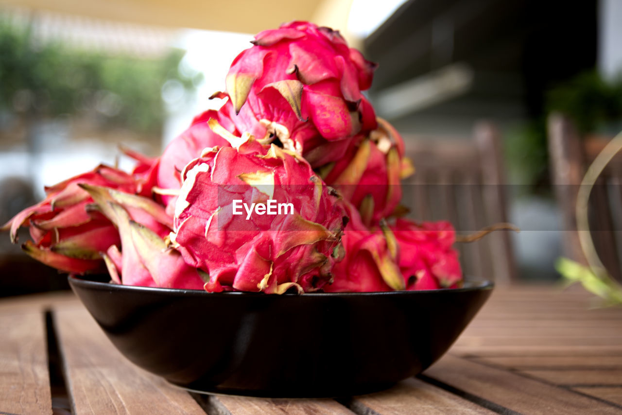 close-up of red chili peppers in bowl on table