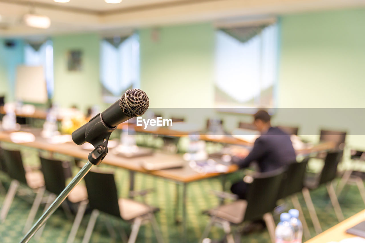 Close-up of microphone in conference room