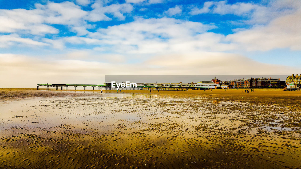 PIER OVER SEA AGAINST SKY